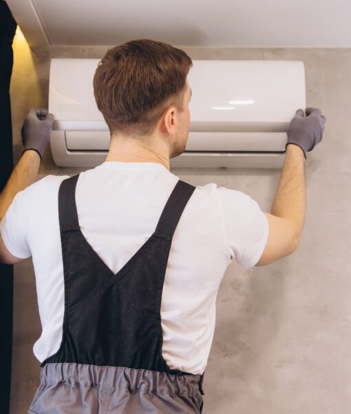 professional-plumber-installing-modern-air-conditi-2025-03-19-17-35-20-utc-min